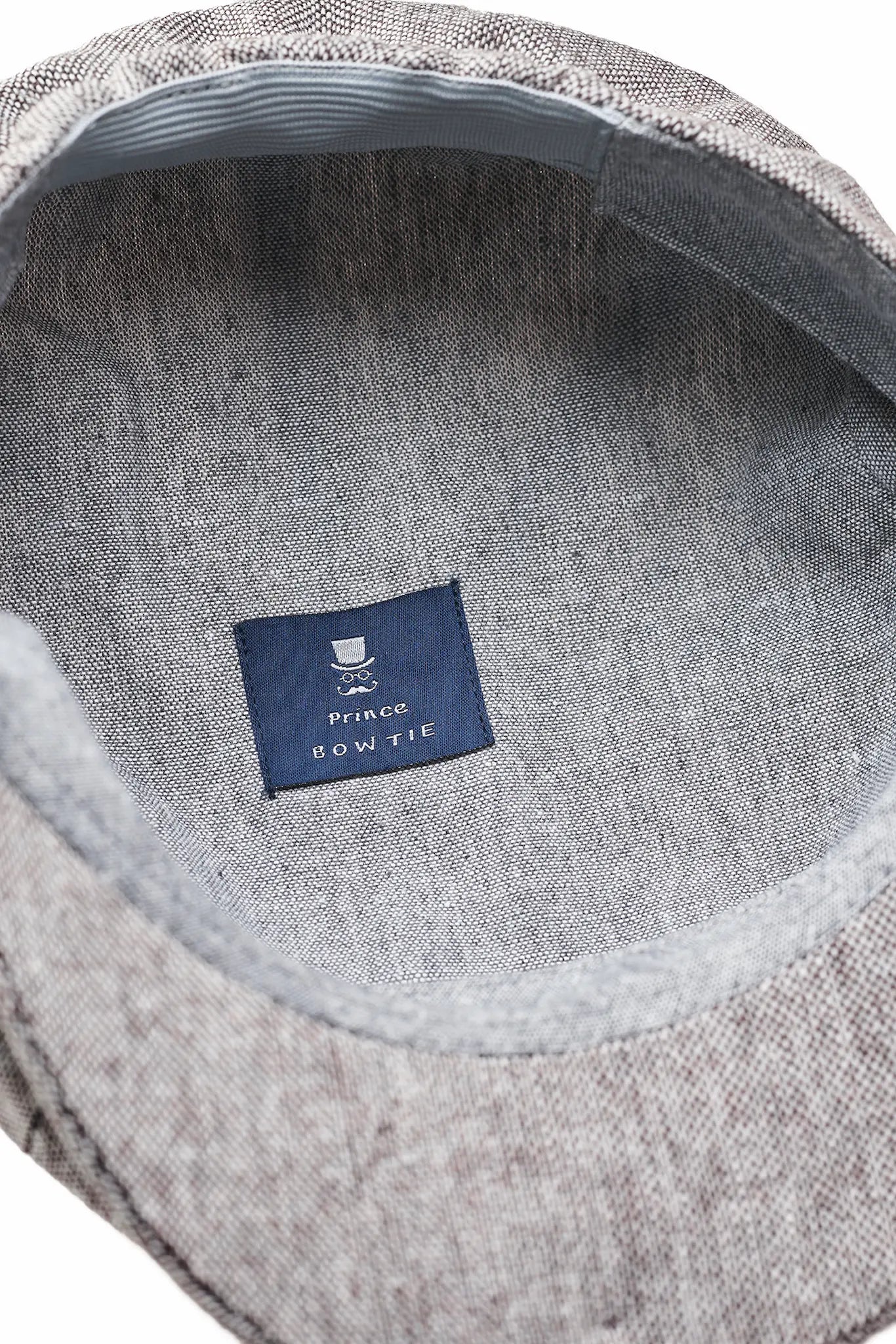 (Beige) Ballonmütze Tweed – Innenseite mit Prince Bowtie Label