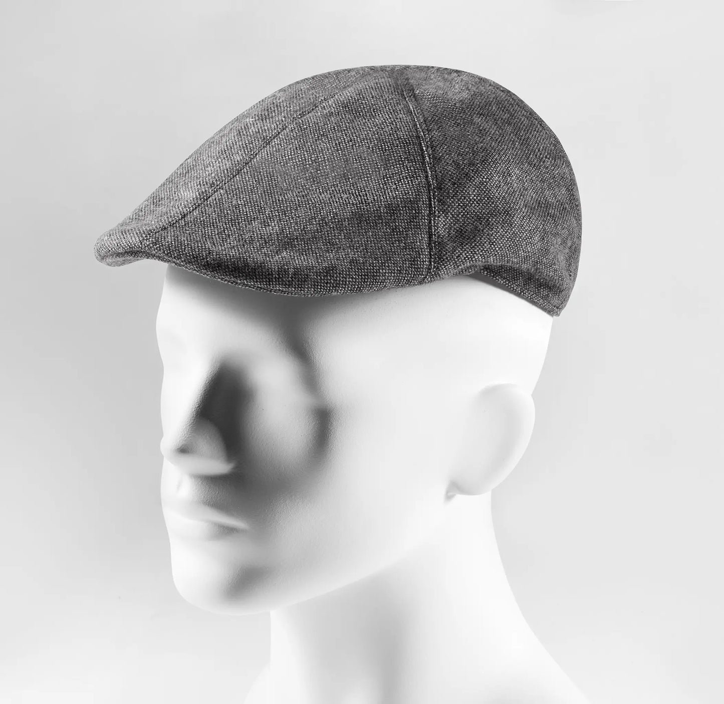 (Grau) Schiebermütze Herren Tweed Flat Cap – Seitenansicht auf Mannequin